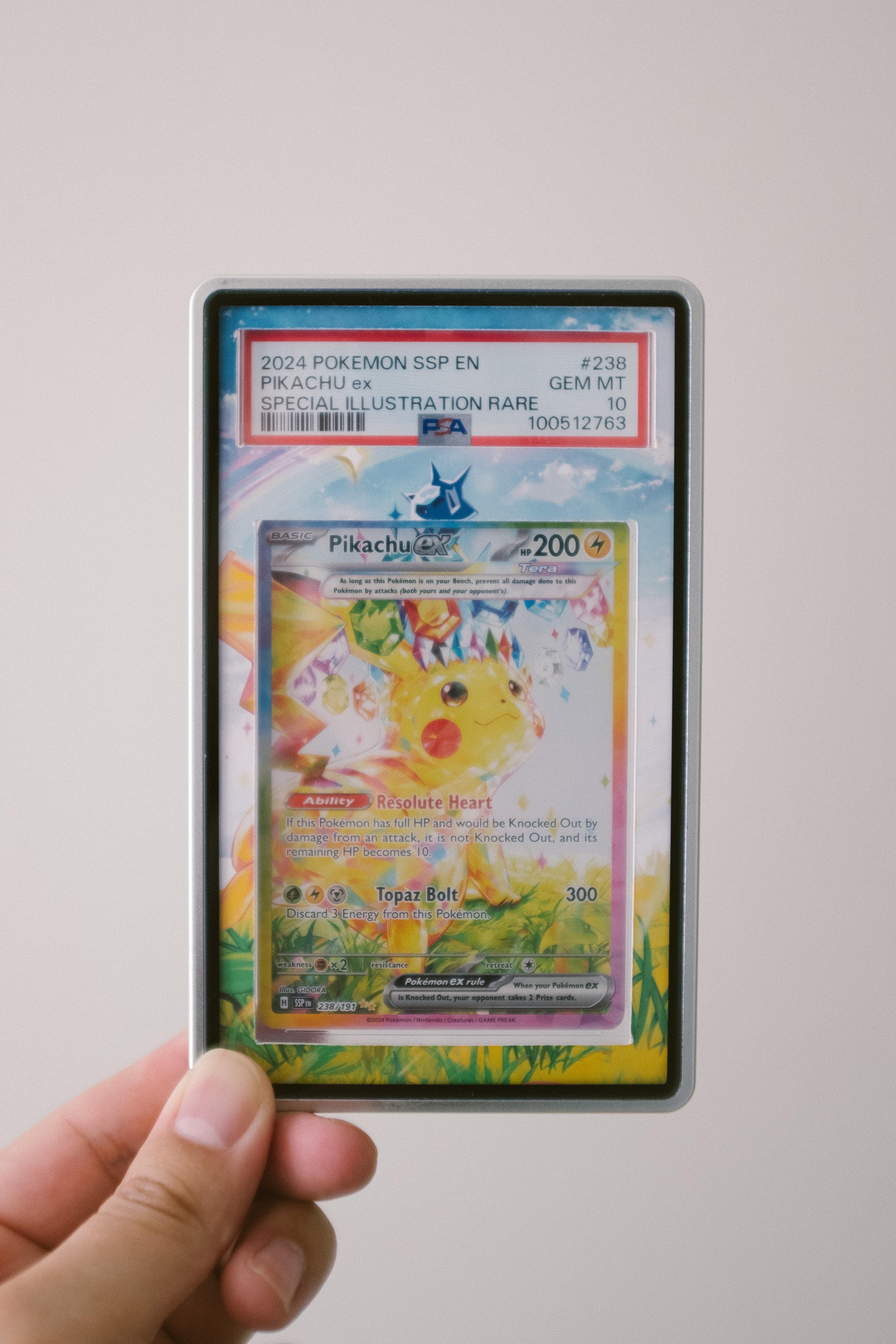 PSA 10 Pikachu ex SIR returned from GameStop grading — a successful submission result